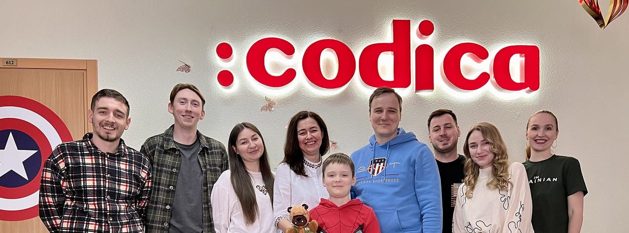 Codica team in the office | Codica