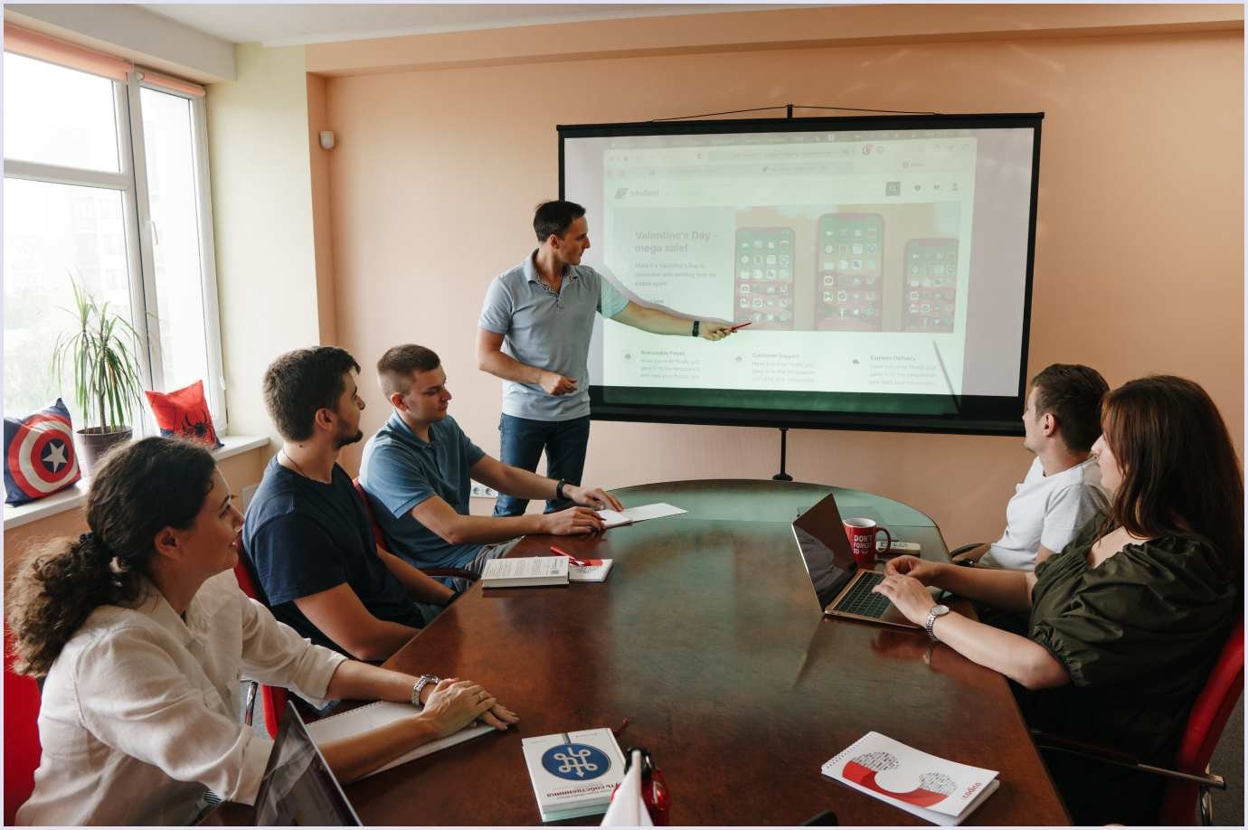 The Codica's team discussion in the office