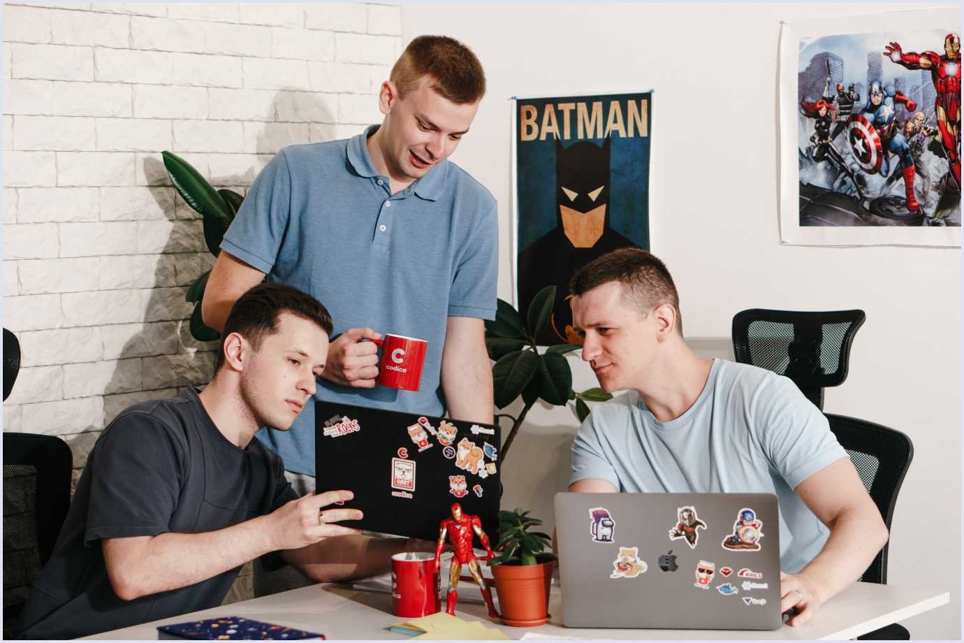 Codica's teammates discuss a task regarding the web security