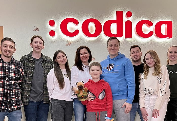 Codica team in the office | Codica